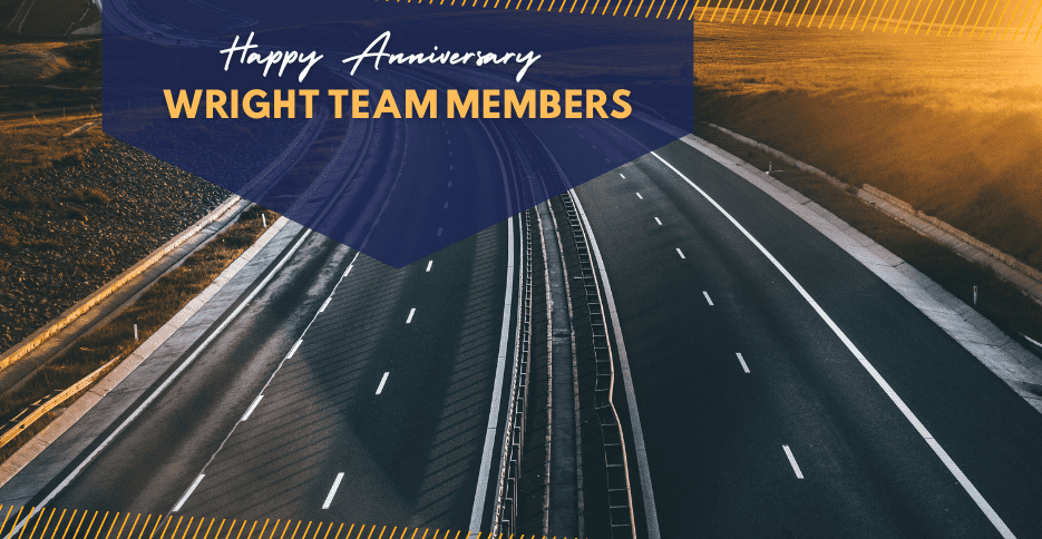 A highway interstate is pictured with no cars on the road. The text reads "Happy anniversary Wright team members."
